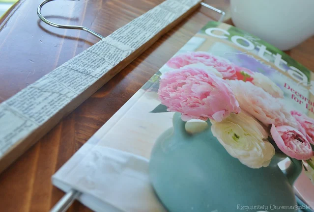 Wooden Magazine Hanger with magazine On table