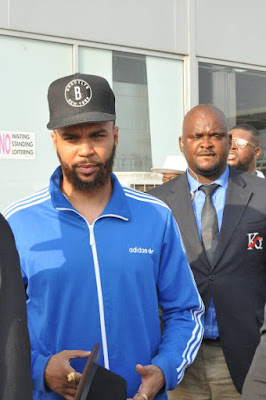 Photos: Singer Jidenna lands in Nigeria surrounded by heavy security