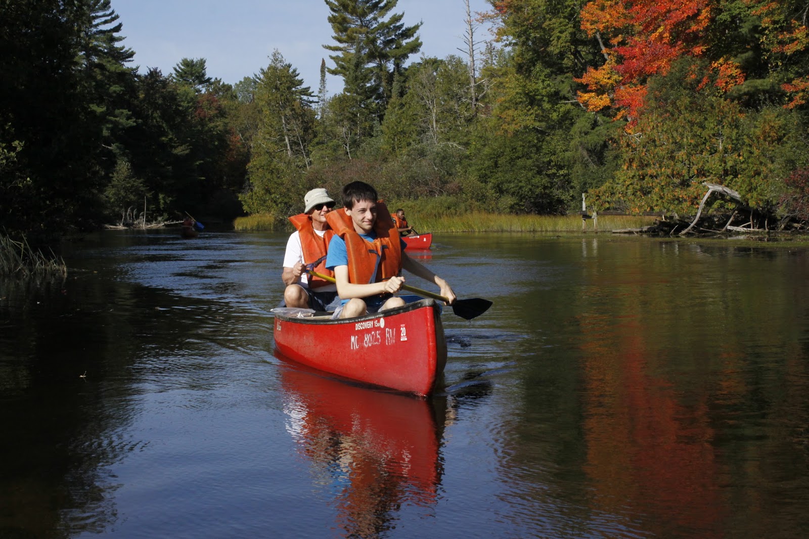 Lacing up my hiking boots Canoeing the Au Sable River is always better