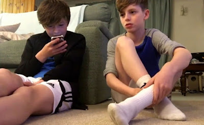 two cute kids white socks nike