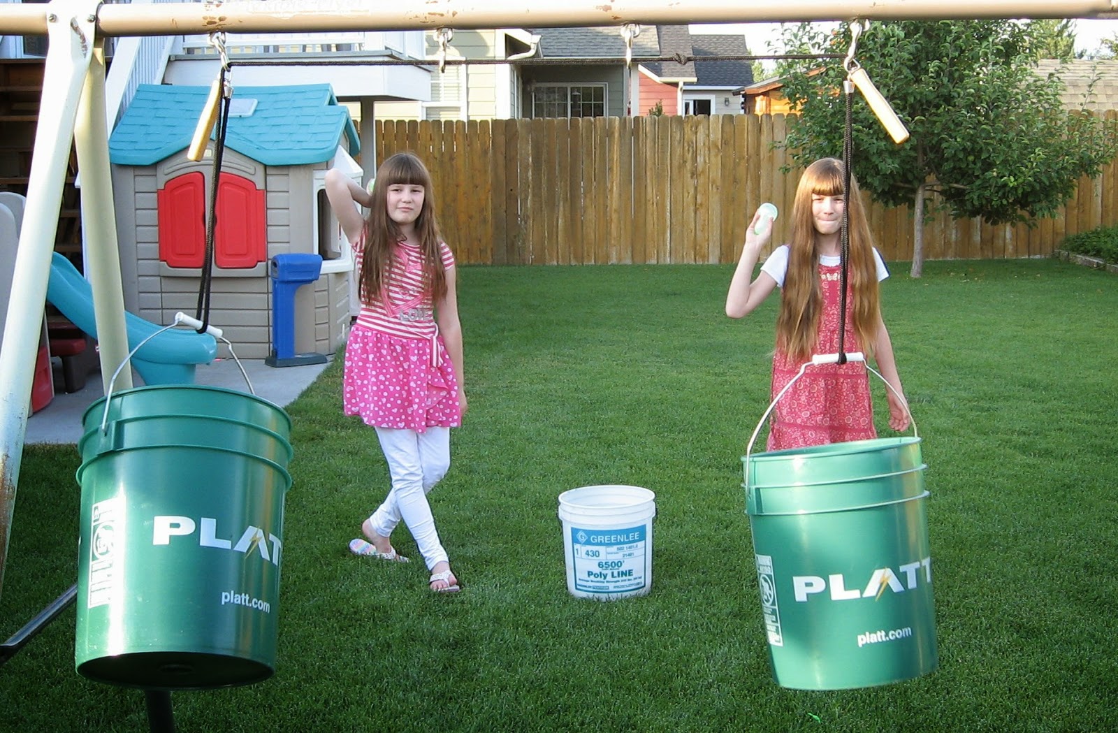 Almost Unschoolers Summer Fun 2014 Tossing Water Balloons into