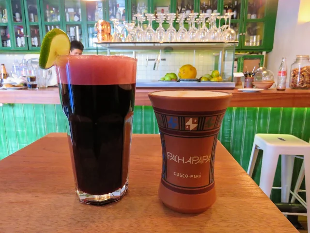 Places to eat in Cusco on a 3 day itinerary: chicha morada and a pisco sour from Pachapapa