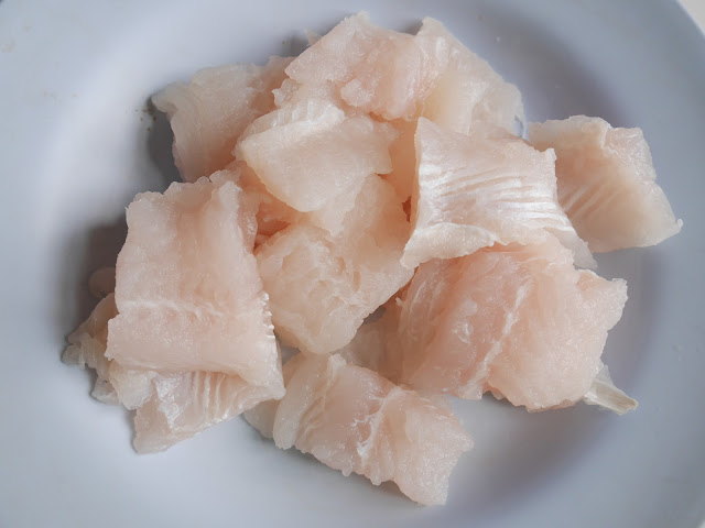 white dory fish cut into large pieces