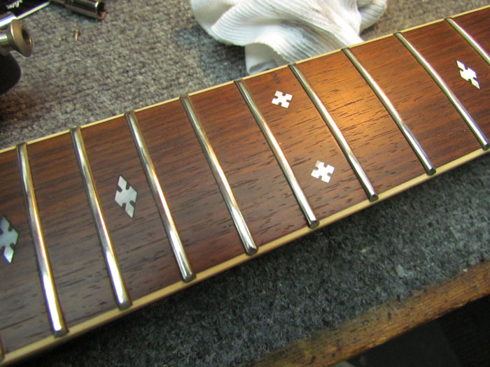 Guitar Fret Polishing and Fingerboard Cleaning Crawls Backward (When