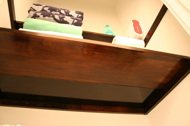 Dark Polyshades stained bathroom closet shelves in Espresso gloss | The Lowcountry Lady