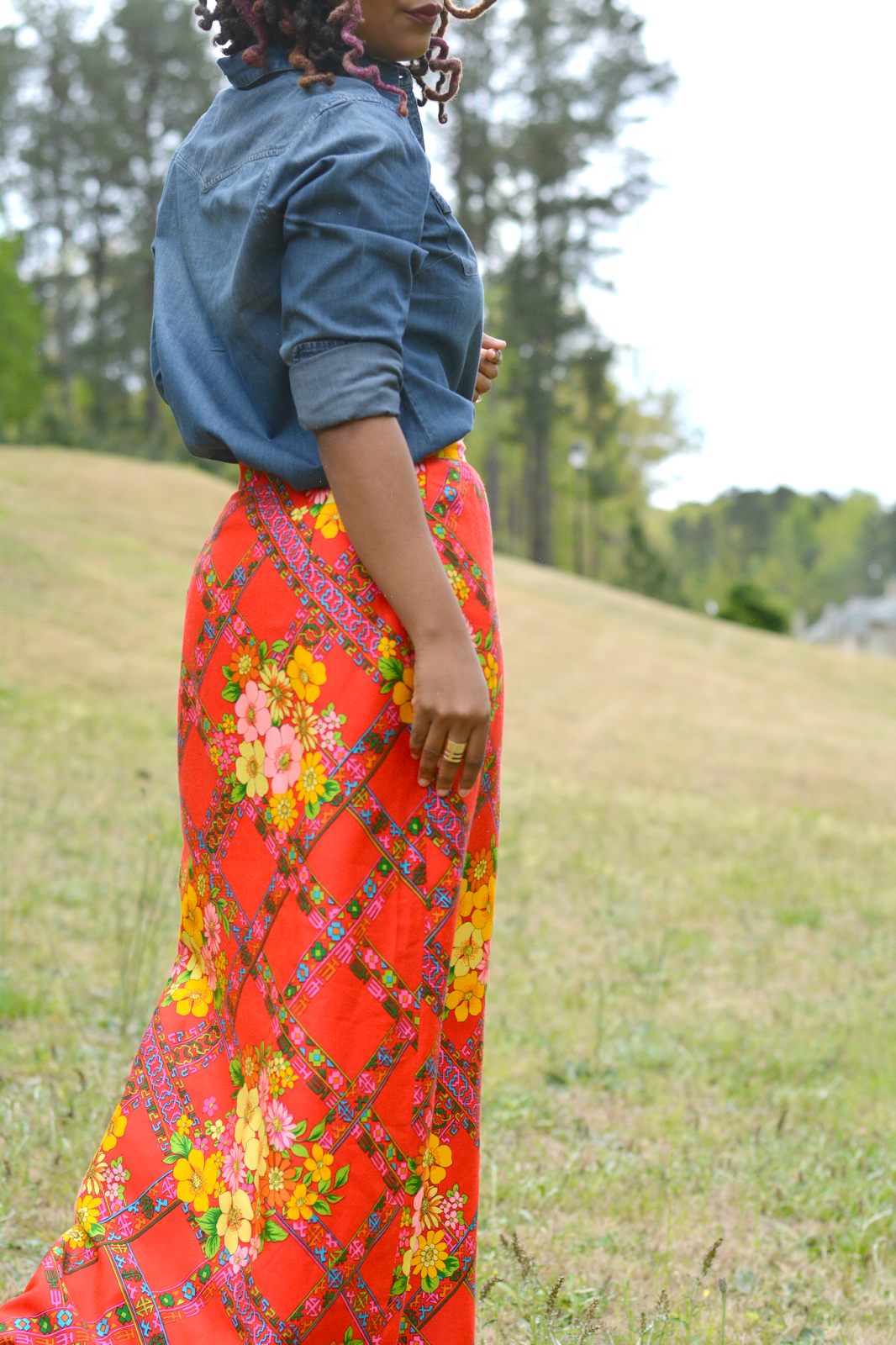 denim shirt worn with vintage floral maxi skirt