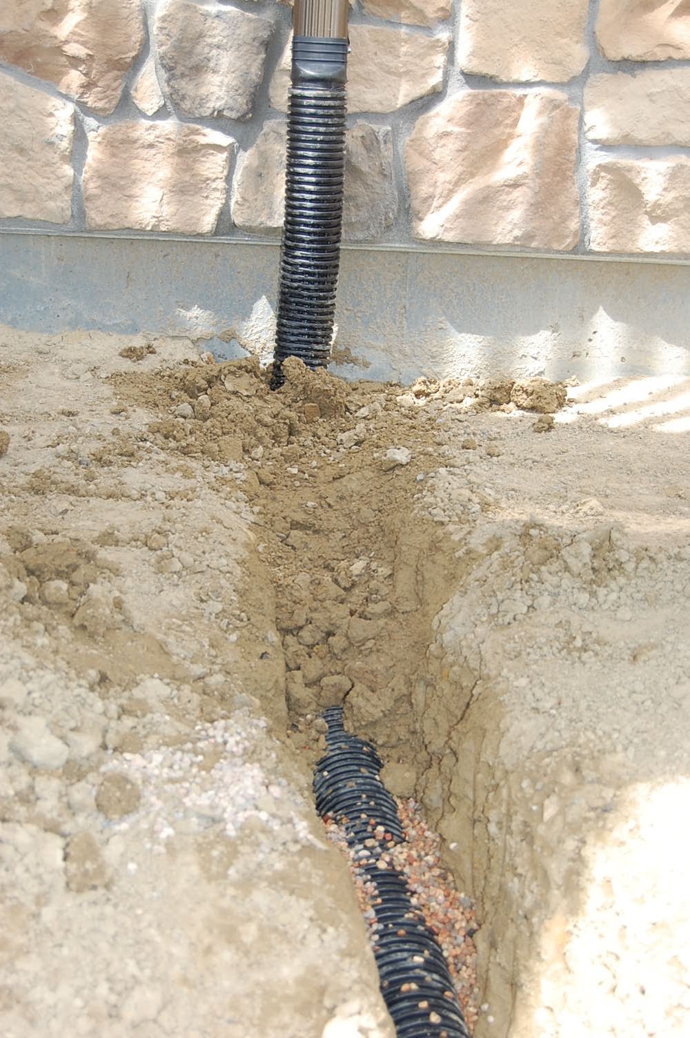 Bigib Designs + How to put downspout underground