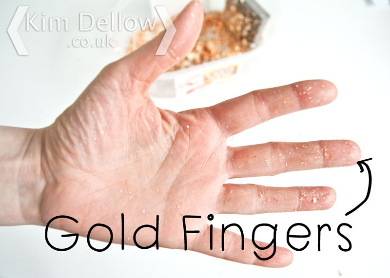 Gold Fingers Fingers covered in Gilding flakes