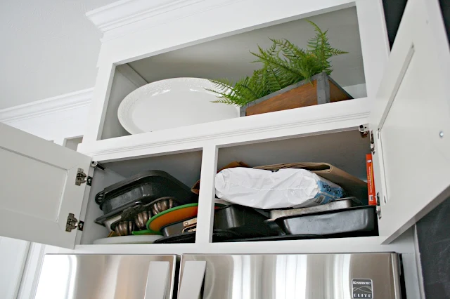 Organizing the space above the refrigerator