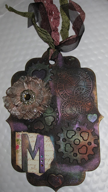 (I love their dies) created a mixed media tag for my friend 