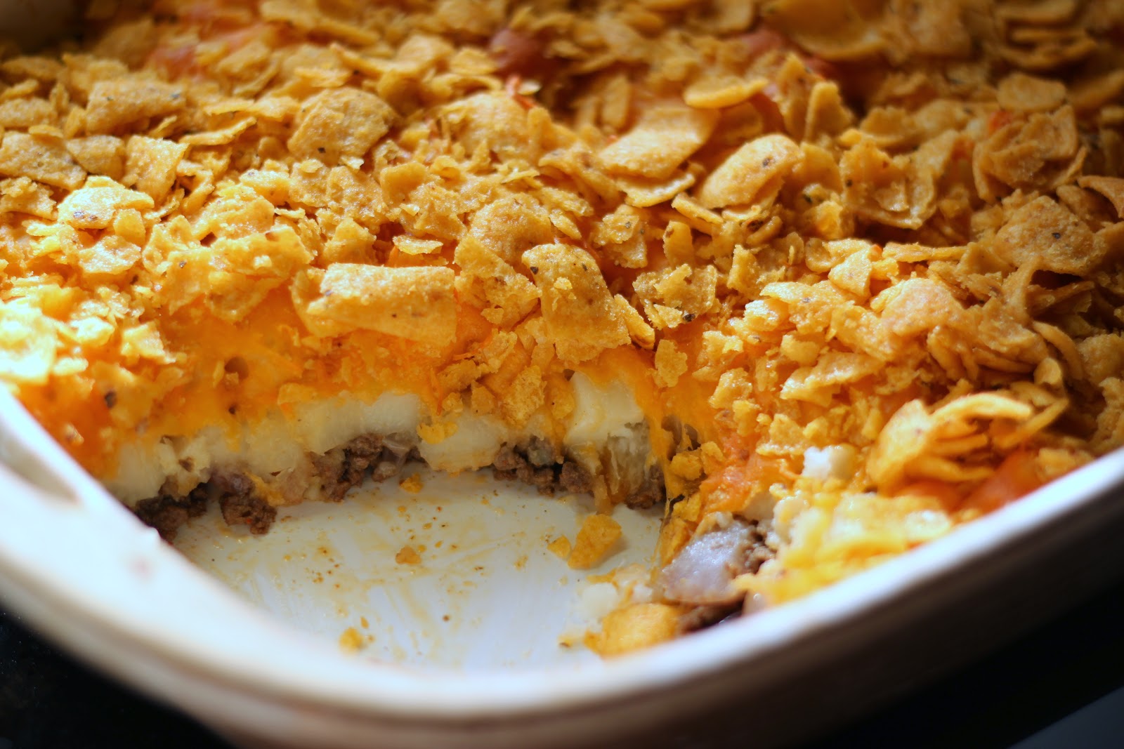 Create this easy potato and meat dish for your next weeknight dinner. The Cheesy Taco Potato Bake uses yummy corn chips as a topping!