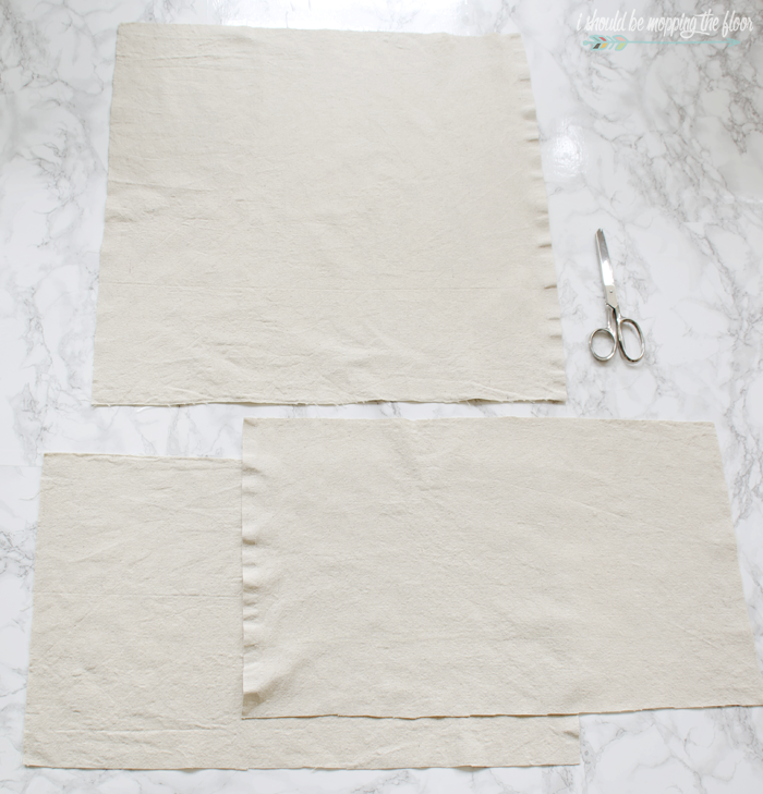 How to Make a Drop Cloth Envelope Pillow Cover | Simple beginning sewing project with step-by-step photo tutorial. These pillow covers are perfect to give ordinary pillows a festive look for the holidays.