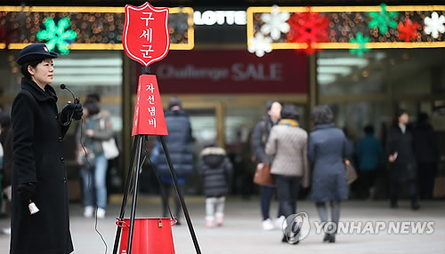 Calderos rojos de la Salvation Army en Navidad, en Seúl