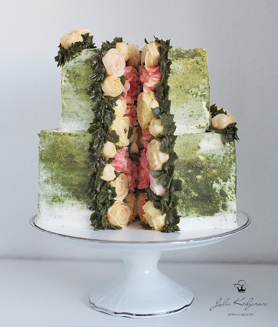 K'Mich Weddings - wedding planning - wedding cake ideas - green cake with flowers in the middle - yulia.kedyarova's profile picture yulia.kedyarova