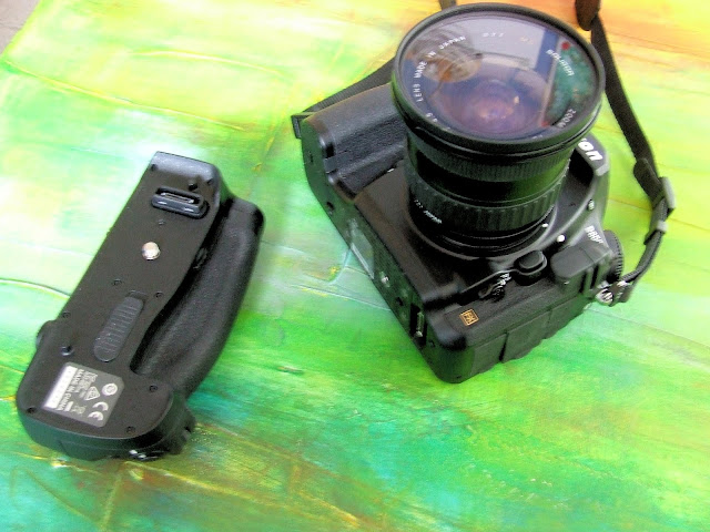 Batterygrip en camera even van elkaar losgekoppeld
