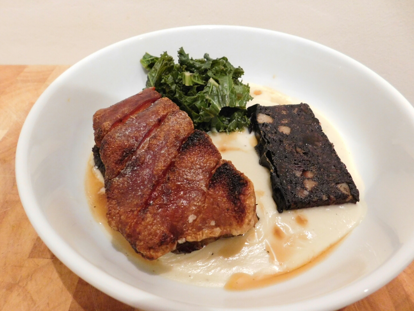 Recipe Confit pork belly with black pudding, cauliflower cheese puree
