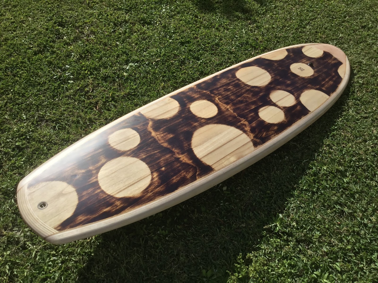 Wooden Surfboards Wooden Greenough edge board.