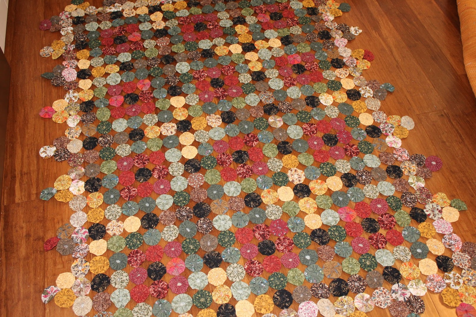 Quilting is more fun than Housework... Yo Yo Quilt