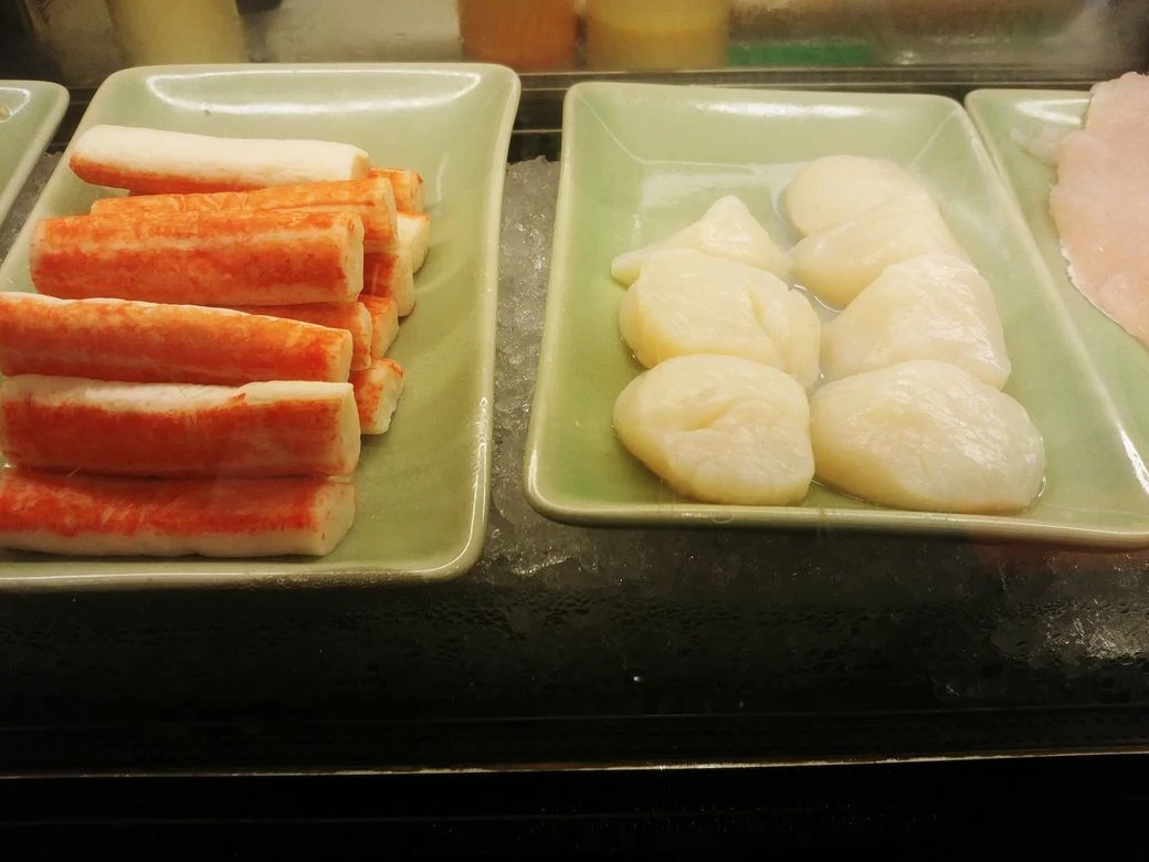Crab sticks and scallops at the Japanese station of the The Grand Kitchen