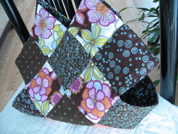 This patchwork bag is made using charm squares and has a great shape due to the way that fabric squares are sewn together.