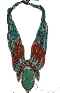 This jewelery has been prepared by introducing several precious stones, in which it has been given a vintage look by embedded turquoise stone in silver frame.