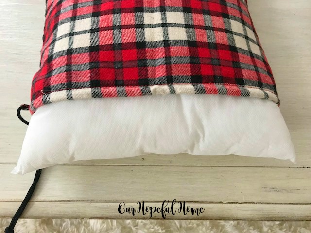 plaid flannel gift sacks filled with pillow form