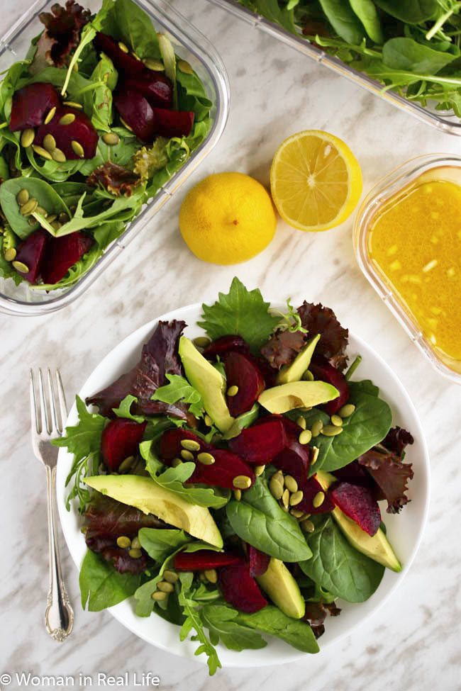 Woman in Real Life Arugula and Mixed Greens Salad With Avocado