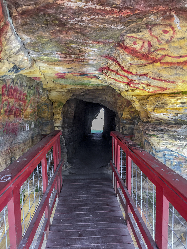 manmade tunnel through sandstone escarpment