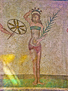 Central figure of the lower register. She