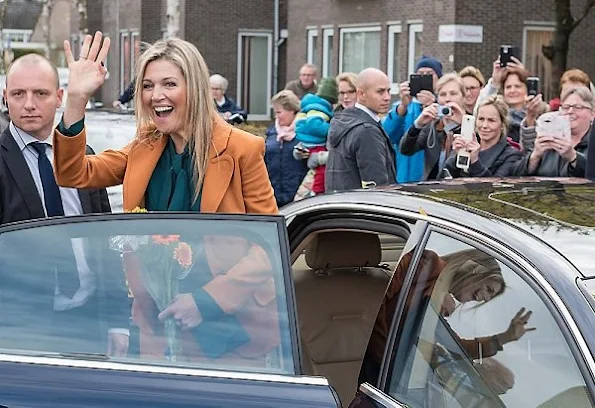 Queen Maxima wore Claes Iversen Pan-Suit from the AW2015 the collection and Gucci Silk Shirt Blouse, Natan Earrings