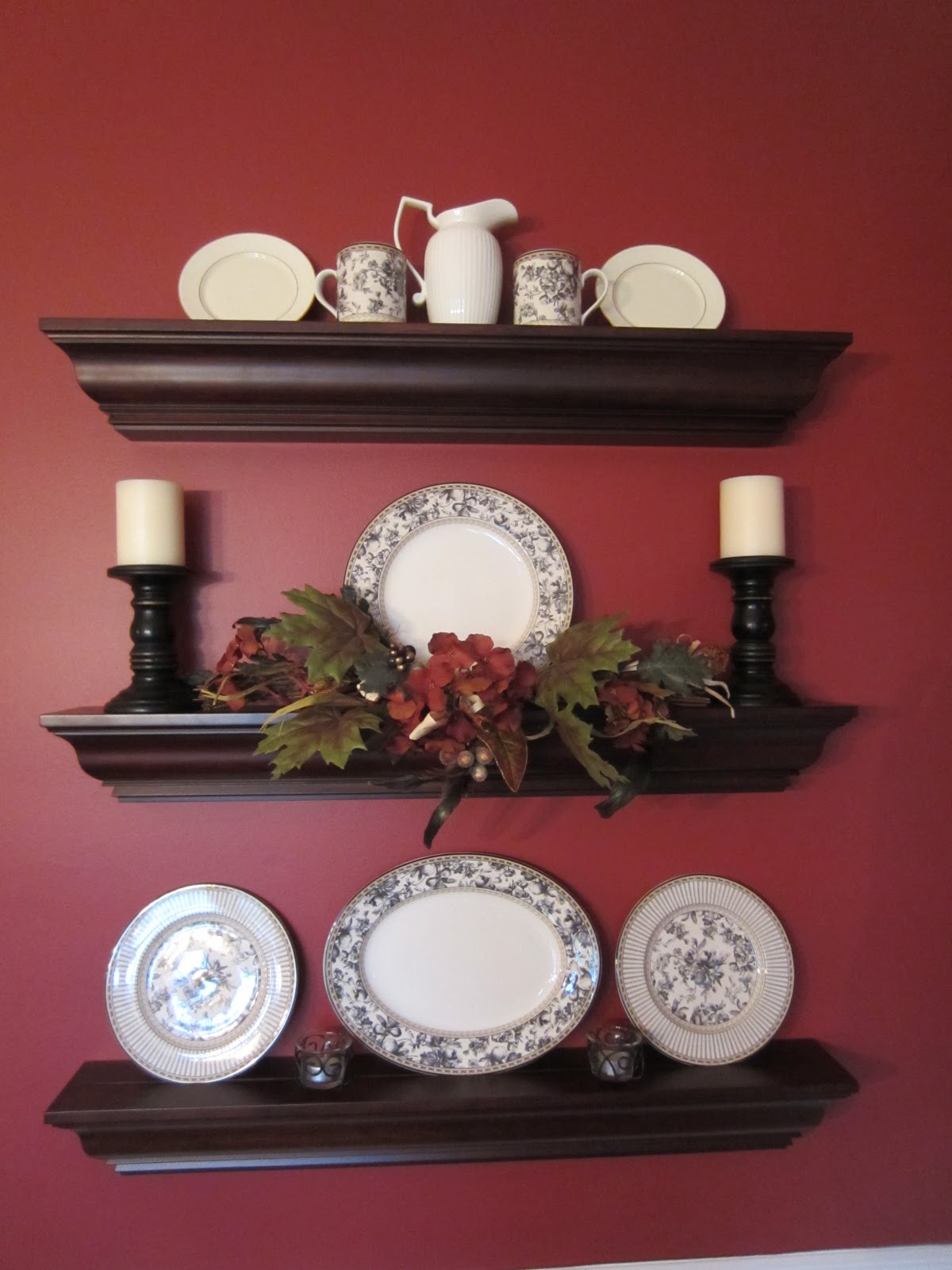 Wall Shelves in dining room decorated for fall