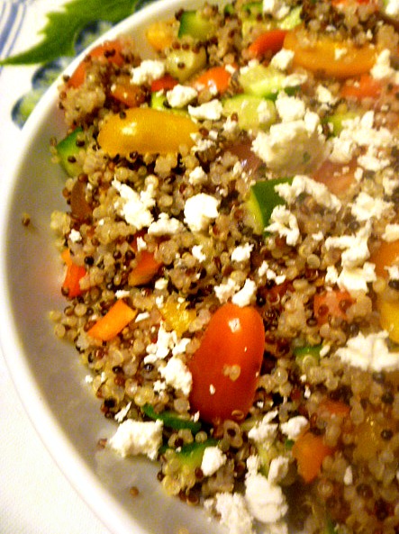 Mediterranean Quinoa Salad has hearty grains that is combined with veggies for a fresh and light side dish with a lemony twist.  Slice of Southern