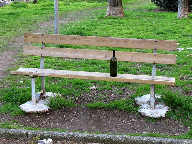 Bench in the morning with an empty bottle of wine, Piazza Anita Garibaldi, Livorno