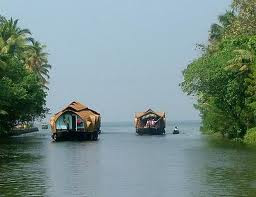 houseboat of kerala is one of the must do activities during your tour holiday in kerala