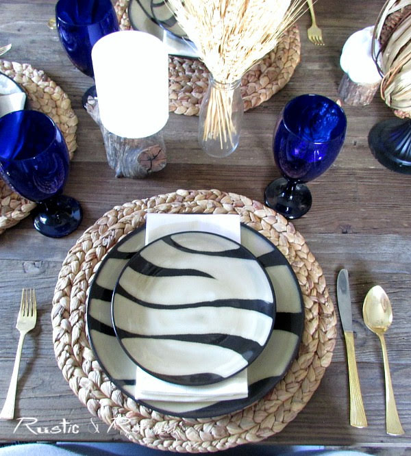 Quick and easy tablescape using zebra striped dishes for great fall texture.
