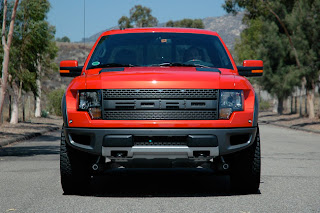 white ford raptor lifted