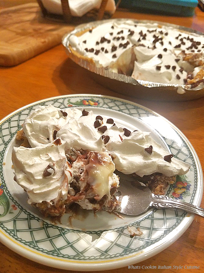 This is a pudding pie made with two kinds of pudding and topped with whipped cream and mini chocolate chips. The pie has a marble effect when cut.