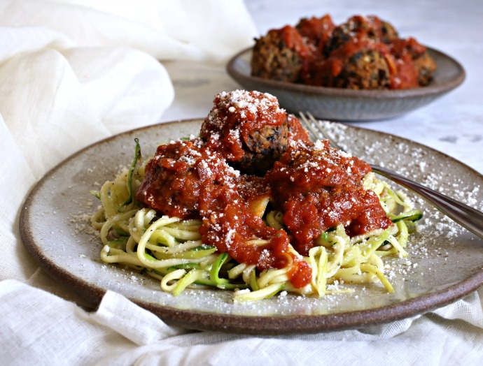 Recipe for sauteed zucchini noodles with vegetable meatballs and tomato sauce.