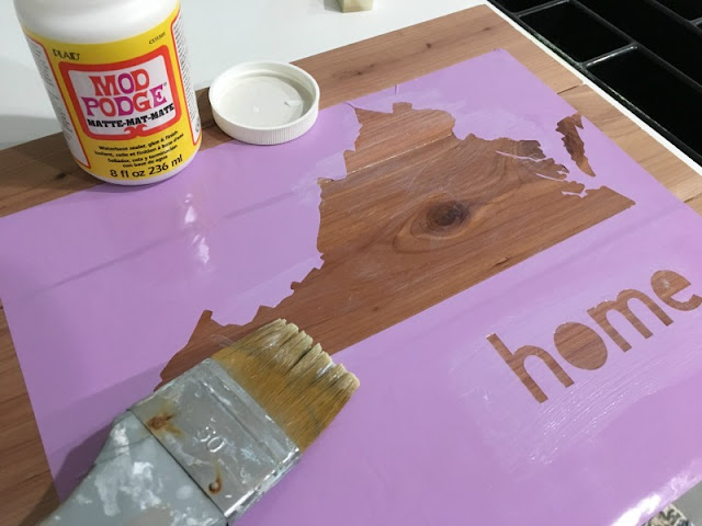 Celebrate your home state with a hand painted cedar sign using a vinyl made with my Cricut.