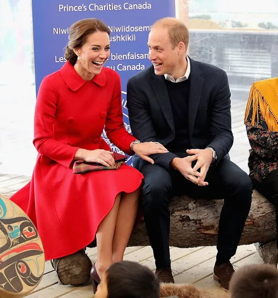 Kate Middleton wore a Ribbed Sleeves Wrapped Coat by Canadian designer Sentaler and new red coat by Venezeulan-American fashion designer Carolina Herrera, Tod's pumps