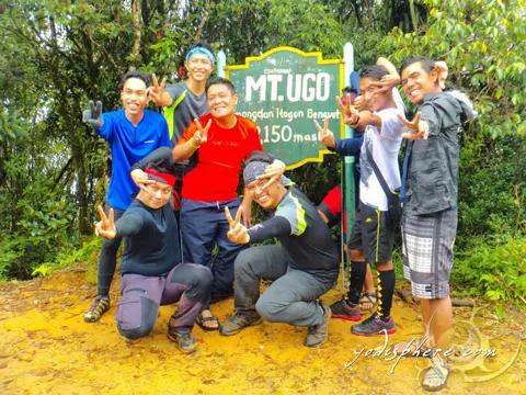 The boys souvenir photo at Mt. Ugo summit marker hover_share