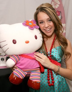 Miley Cyrus (Hannah Montana) with Hello Kitty plush doll soft toy