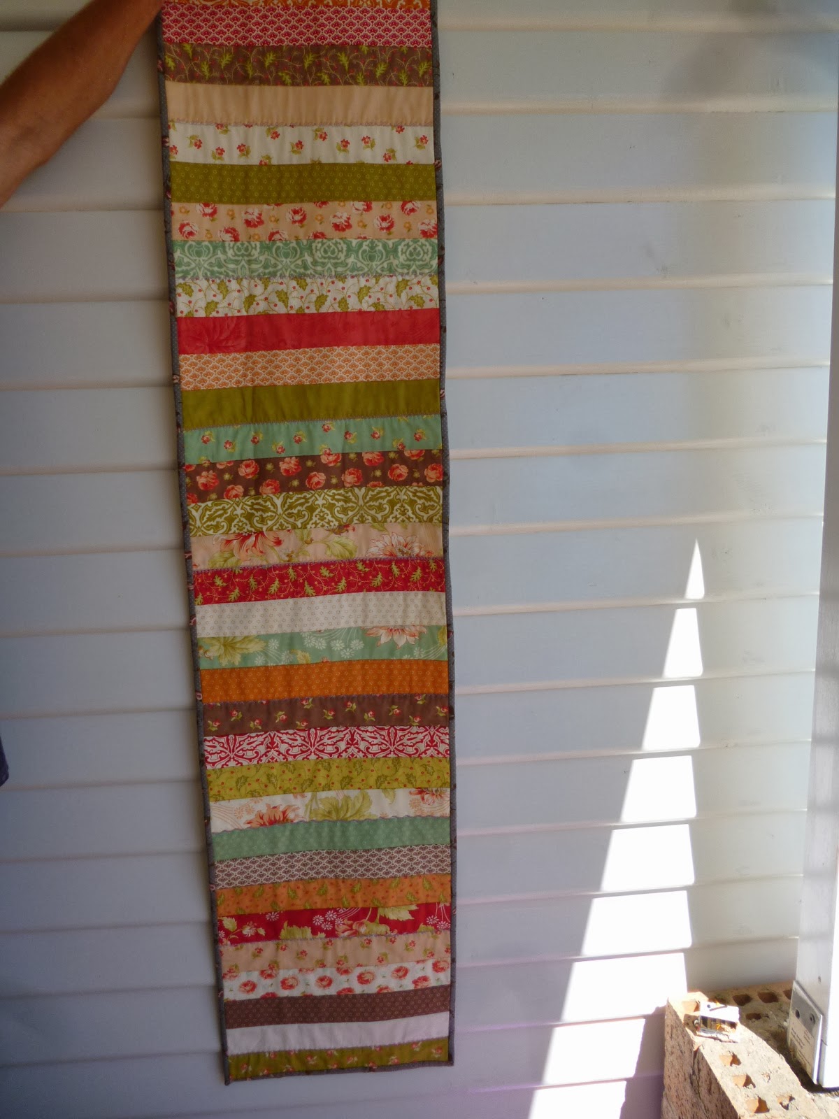 One Red Cherry Quick Jelly Roll Table Runner