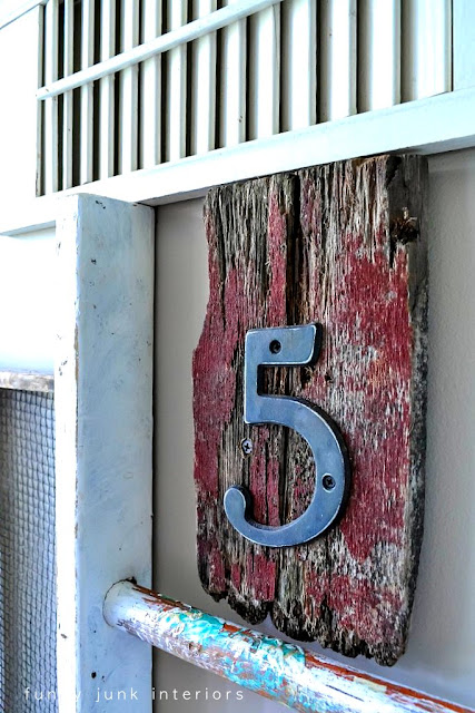 five rustic house number junk wall / Wall art with junk for coats - a unique entryway by FunkyJunkInteriors.net