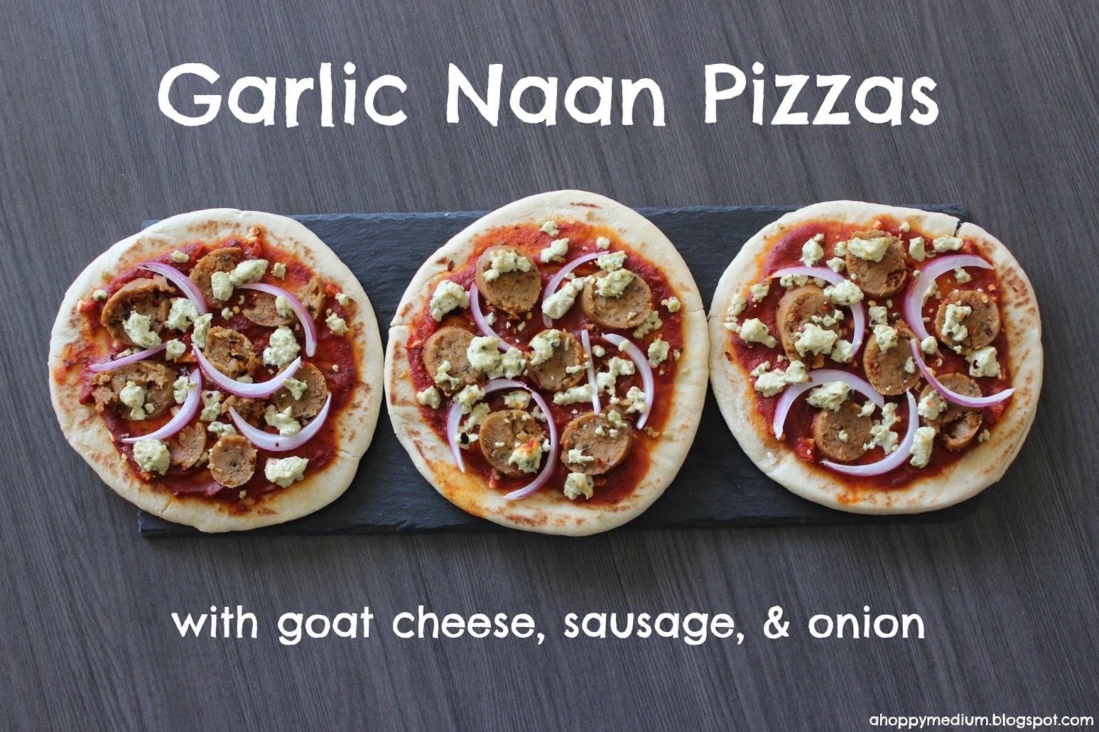 A Hoppy Medium Garlic Naan Pizzas with Goat Cheese, Sausage, and Onion