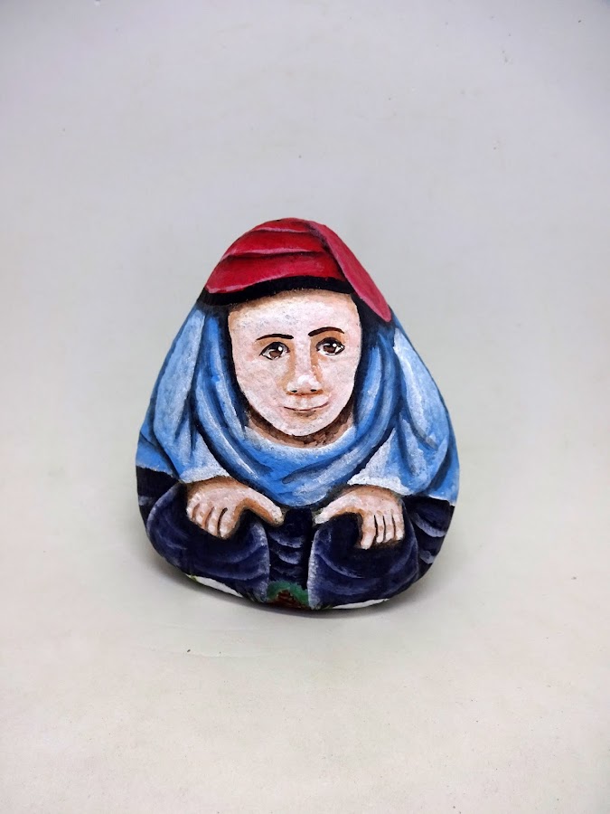 como pintar un caganer en una piedra