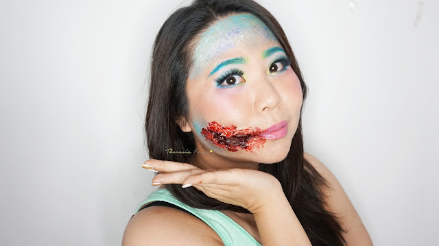 How to look like a Mermaid with torn bloody lips for halloween. Special Effect makeup with some face painting for you who loves the scary, gory and bloody makeup for Halloween. Come and Join my Makeup and Hairdo Course to learn the technique with Theresia Feegy in Jakarta. Available for Personal Makeup Course, Advance Intense Pro Makeup Course, One Day Wedding Makeup Course and Basic Hairdo Course. For pricing and inquiries, kindly email to muses.wonderland@yahoo.com