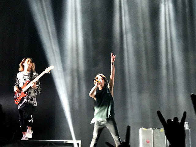 Taka (vocals) and Ryota (bass) from One OK Rock