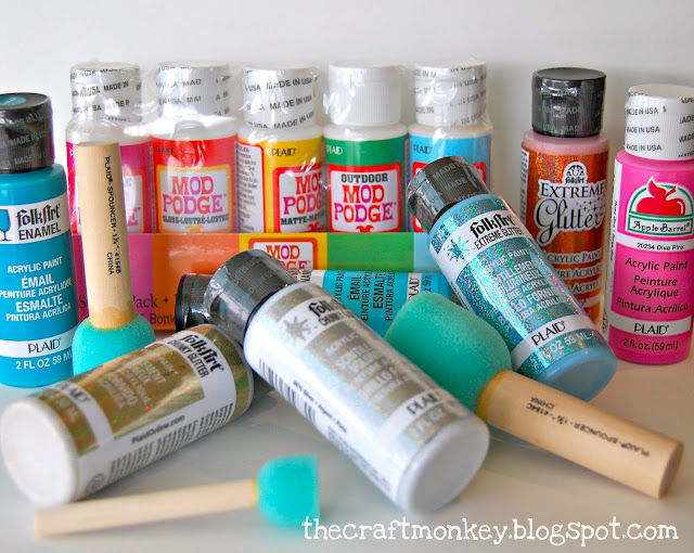 Mod Podge and paint containers