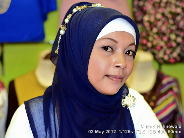 people, Indonesian Muslim lady, street portrait, headshot, Indonesia; Sumatra, Bukittinggi, beauty, blue hijab